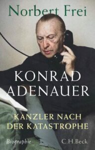 Porträt eines Mannes mit Telefonhörer, schwarzer Pullover, grauem Hintergrund, Buchcover mit Titel und Autor.